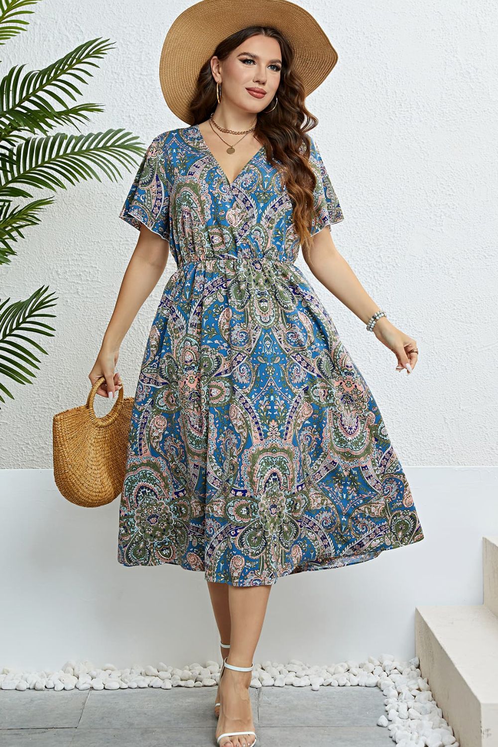 Vestido midi con mangas acampanadas estampadas