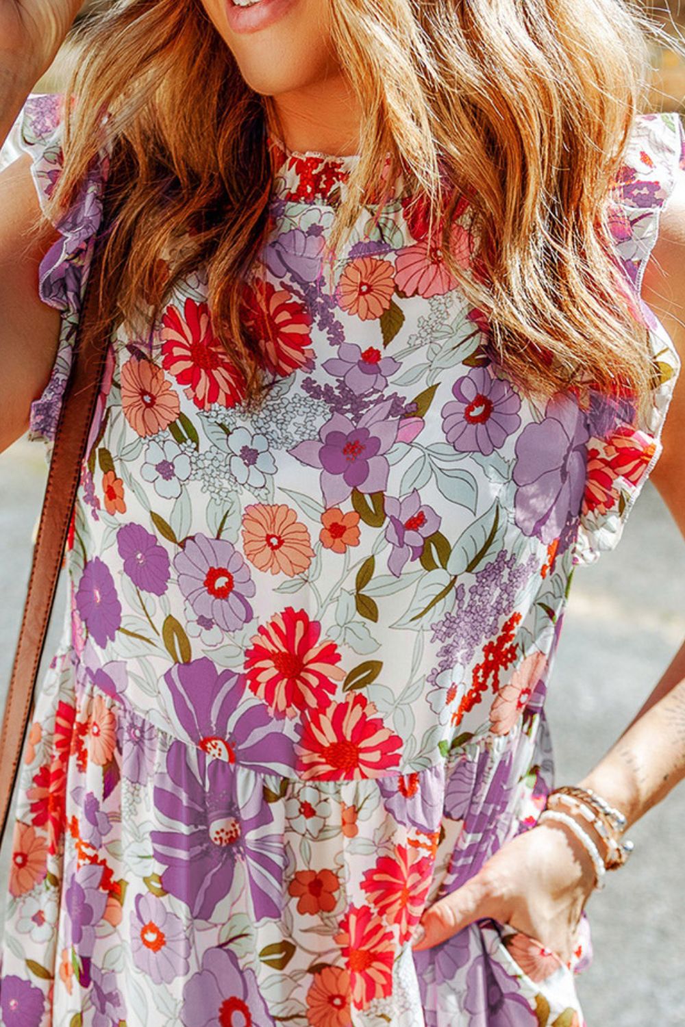 Vestido floral con volantes en capas