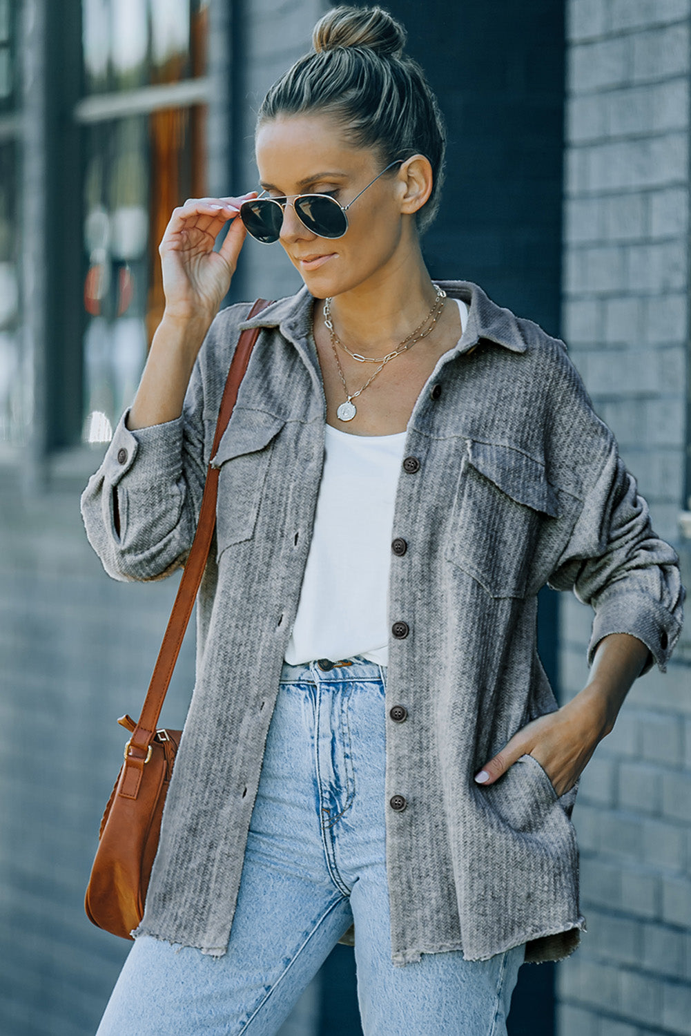 Chaqueta tipo camisa texturizada con botones y bolsillos