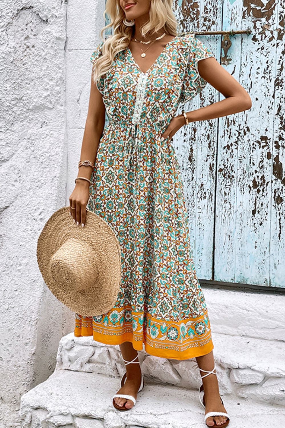 Vestido bohemio con cuello en V y mangas acampanadas