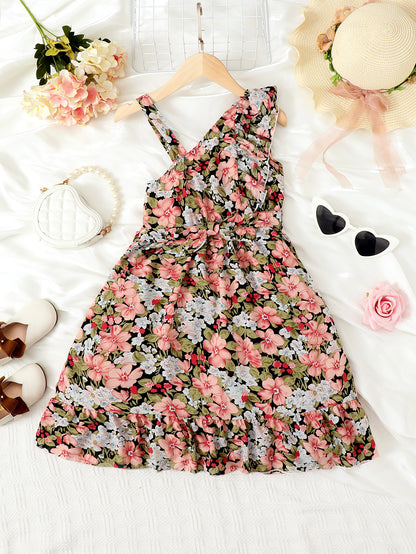 Vestido floral con cuello asimétrico y volantes