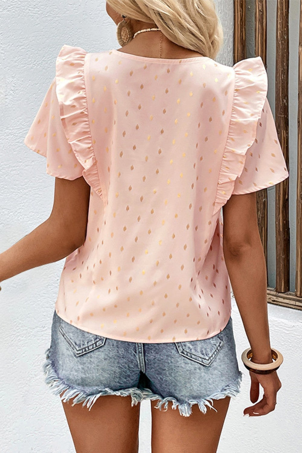 Blusa estampada con ribete de volantes y detalle plisado