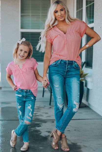 Camiseta con botones y manga enrollable para mujer