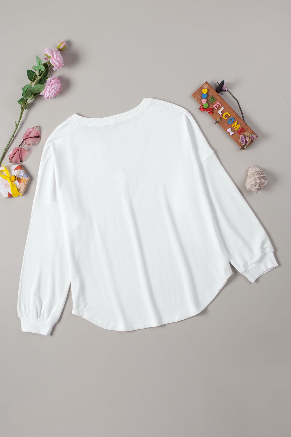 Button Detail Curved Hem Top