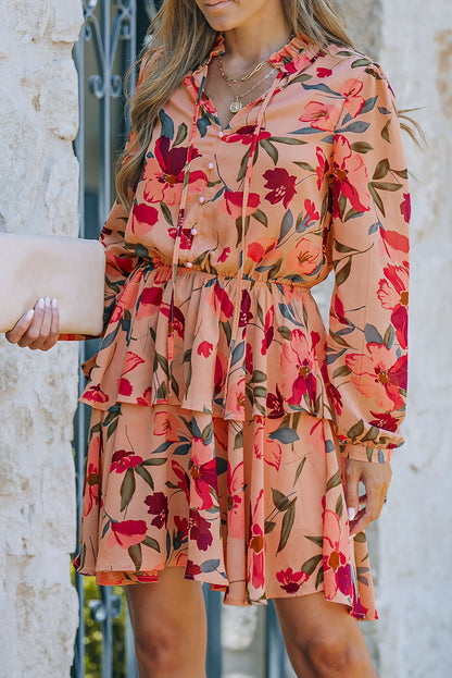 Vestido a capas de manga larga con cuello anudado floral