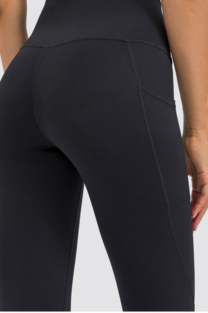 Leggings de yoga de tiro alto con bolsillo lateral