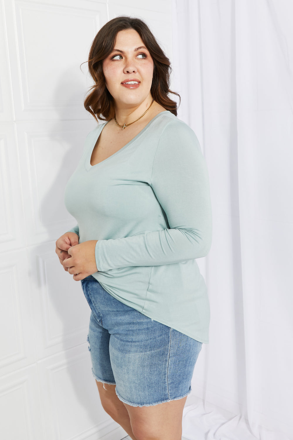 Zenana Full Size V-Neck Curved Hem Top in Light Green