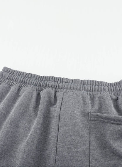 Joggers de cintura elástica con bolsillos de talla grande