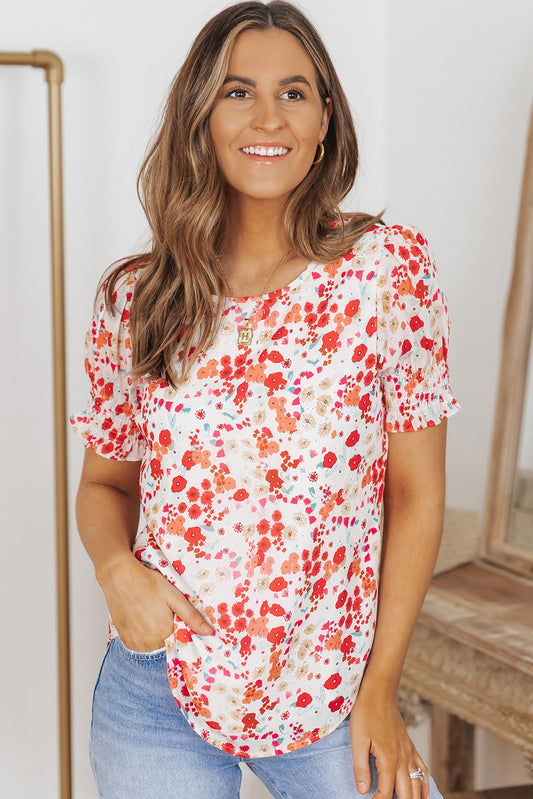 Blusa floral con volantes y manga fruncida