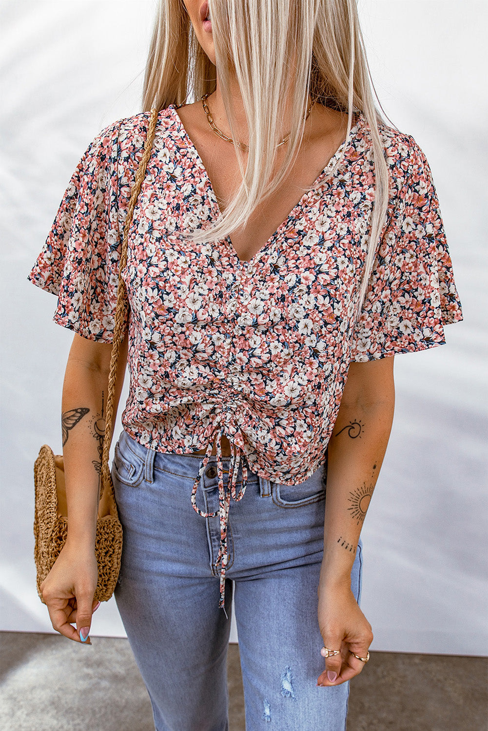 Blusa corta con cordón floral y manga alborotada