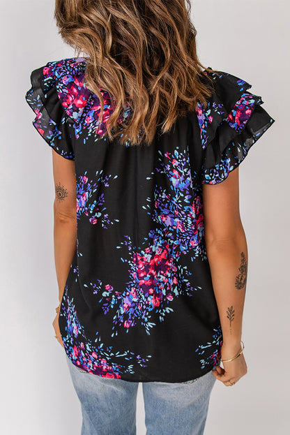 Blusa floral con mangas acampanadas y cuello anudado