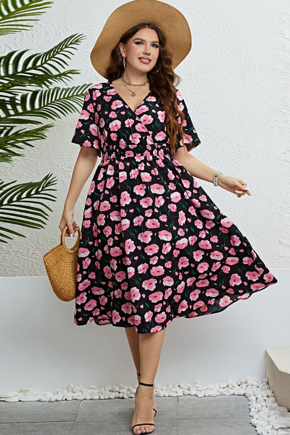 Vestido midi con sobrepelliz floral