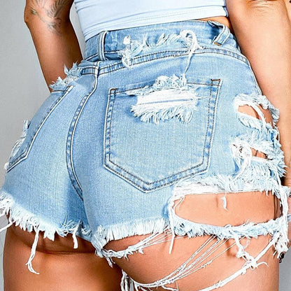 Shorts vaqueros desgastados asimétricos